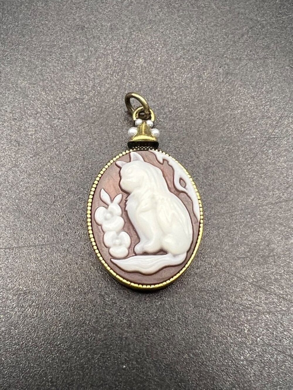 Vintage Cat Cameo Pendant Gold-Tone Frame Pearl Accents Deep Plum Background